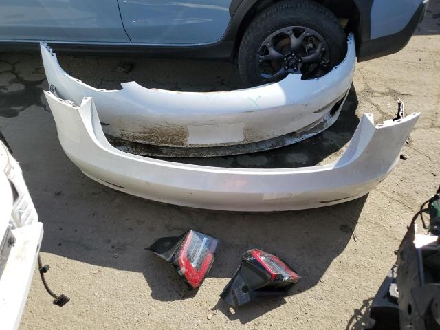 Photo 12 from auction – 2018 TESLA MODEL 3 with VIN 5YJ3E1EA5JF009205