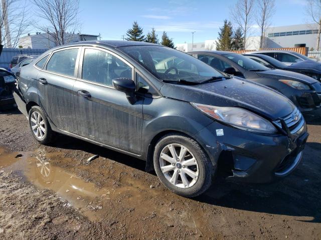 Photo 4 from auction – 2011 FORD FIESTA SE with VIN 3FADP4BJ9BM126552