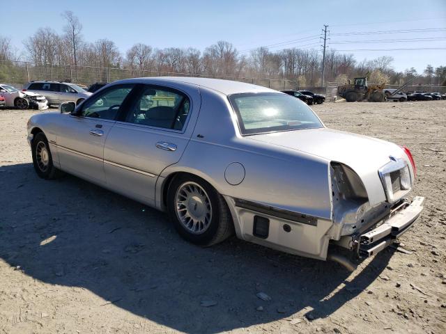 Photo 2 from auction – 2000 LINCOLN TOWN CAR C with VIN 1LNHM83W3YY894736