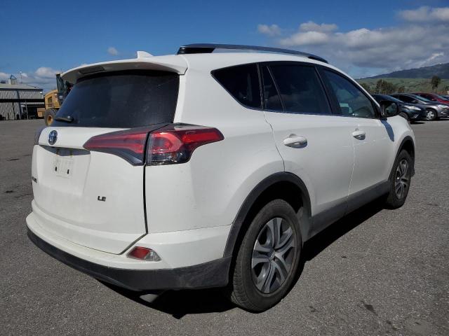Photo 3 from auction – 2018 TOYOTA RAV4 LE with VIN JTMZFREV5JJ159767