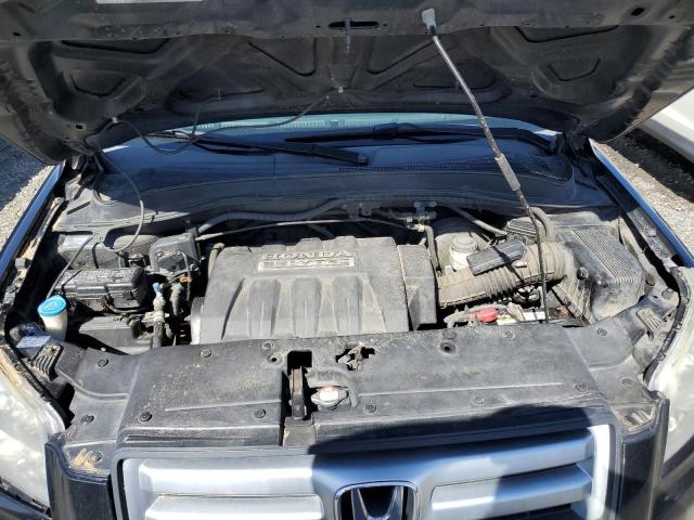Photo 11 from auction – 2006 HONDA PILOT EX with VIN 5FNYF28576B050322