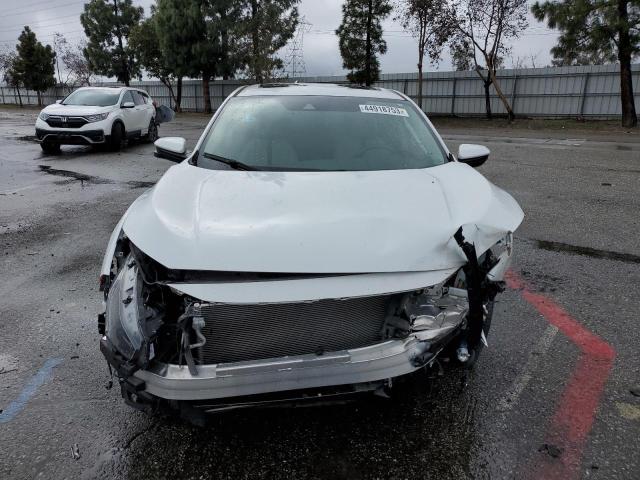 Photo 5 from auction – 2020 HONDA CIVIC EX with VIN 19XFC1F35LE200392