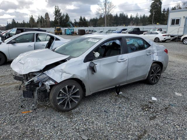 TOYOTA COROLLA L 2018 with VIN 5YFBURHE0JP800421 - Photo from auction