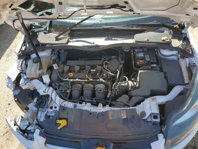 Photo 11 from auction – 2014 FORD FOCUS TITA with VIN 1FADP3J20EL436826