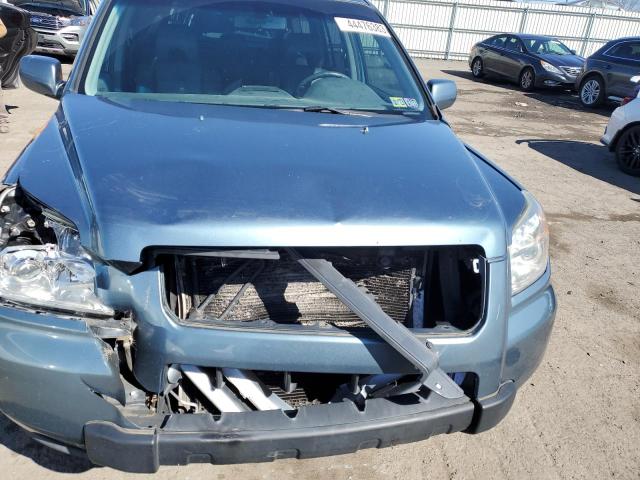 Photo 11 from auction – 2006 HONDA PILOT EX with VIN 5FNYF18536B025590