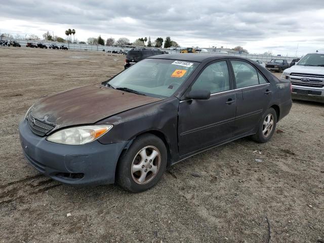 Photo 1 from auction – 2002 TOYOTA CAMRY LE with VIN JTDBE32K220003673