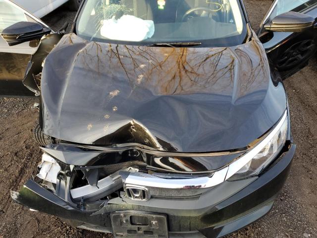 Photo 11 from auction – 2018 HONDA CIVIC EX with VIN 19XFC2F71JE205837