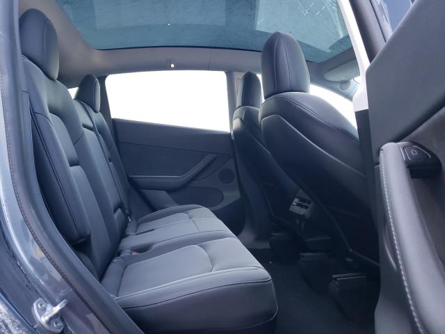 Photo 10 from auction – 2021 TESLA MODEL Y with VIN 5YJYGDED0MF106957
