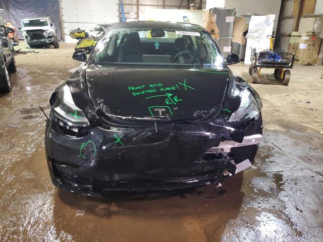 Photo 5 from auction – 2022 TESLA MODEL 3 with VIN 5YJ3E1EA2NF186249