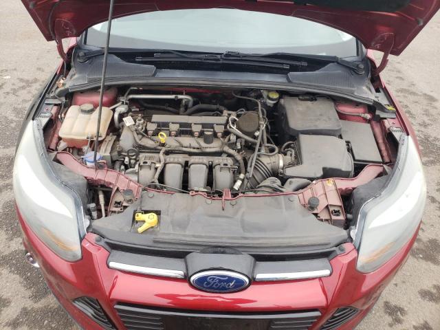 Photo 11 from auction – 2014 FORD FOCUS TITA with VIN 1FADP3N25EL422852