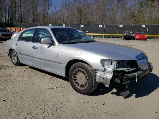 Photo 4 from auction – 2000 LINCOLN TOWN CAR C with VIN 1LNHM83W3YY894736