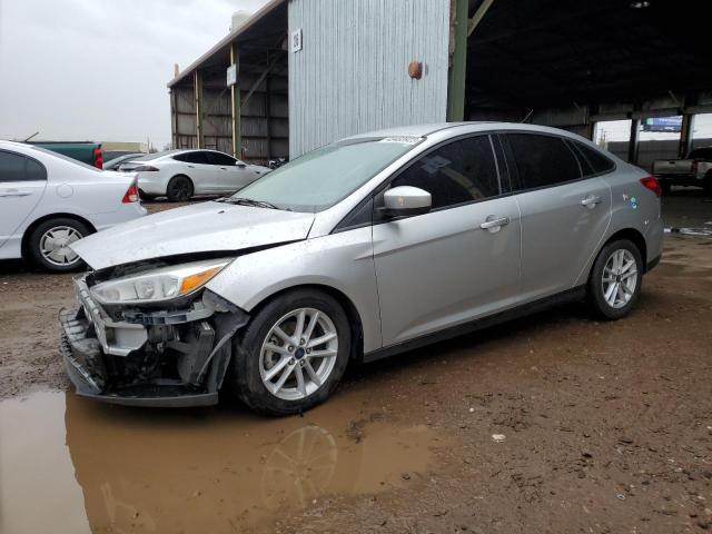 FORD FOCUS SE 2018 with VIN 1FADP3F2XJL229945 - Photo from auction