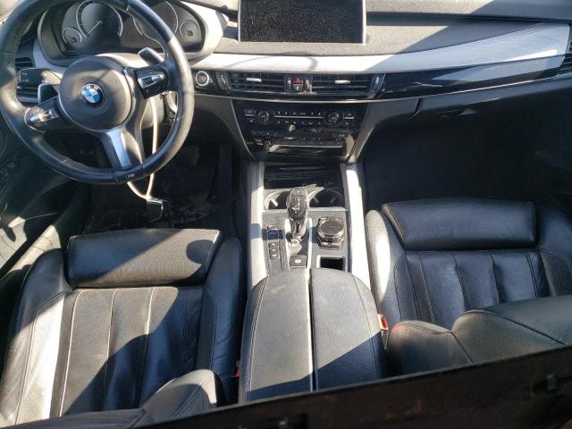 Photo 8 from auction – 2014 BMW X5 XDRIVE5 with VIN 5UXKR6C58E0J72081