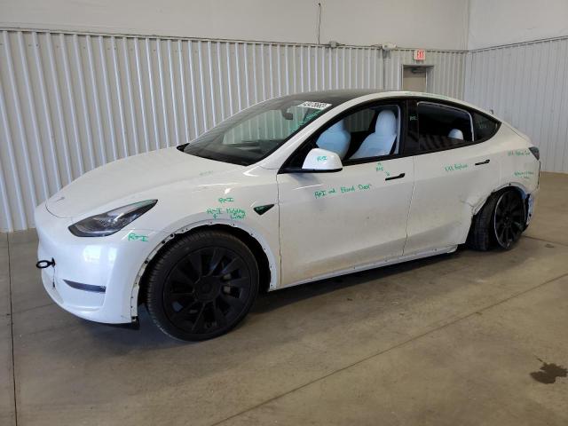 TESLA MODEL Y 2023 with VIN 7SAYGDEE8PF599772 - Photo from auction