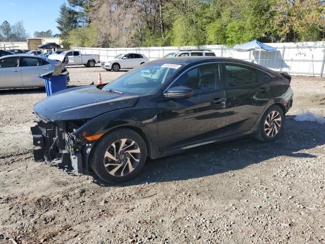 HONDA CIVIC EX 2018 with VIN 19XFC2F70JE203609 - Photo from auction