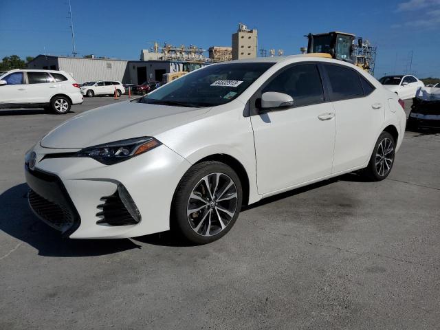 TOYOTA COROLLA L 2017 with VIN 5YFBURHEXHP632975 - Photo from auction