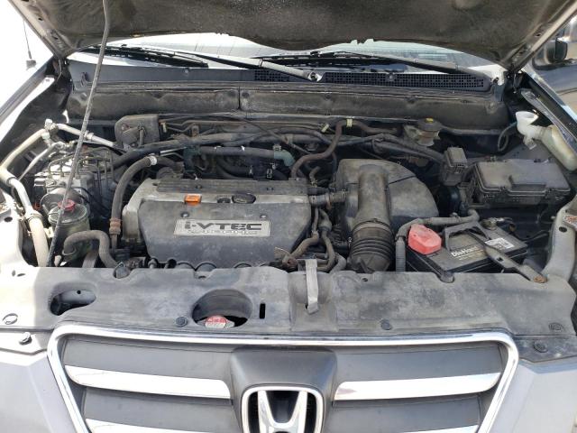 Photo 12 from auction – 2005 HONDA CR-V SE with VIN JHLRD78995C052419