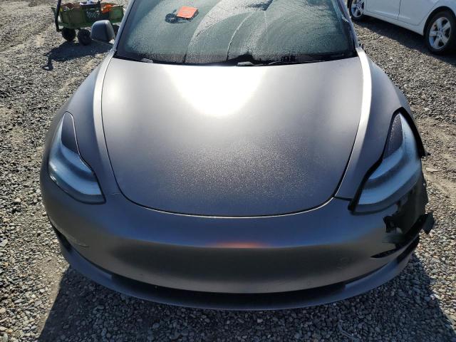 Photo 11 from auction – 2019 TESLA MODEL 3 with VIN 5YJ3E1EB2KF385760