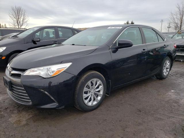 TOYOTA CAMRY LE 2016 with VIN 4T1BF1FK0GU582847 - Photo from auction