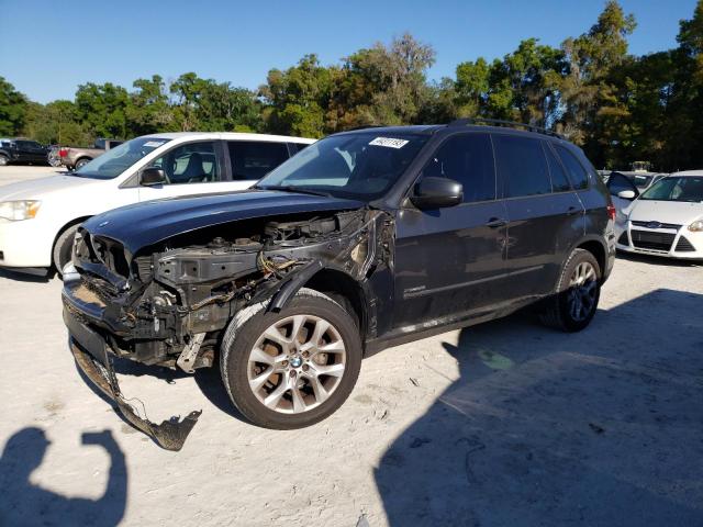 BMW X5 2012 with VIN 5UXZV4C5XCL753883 - Photo from auction