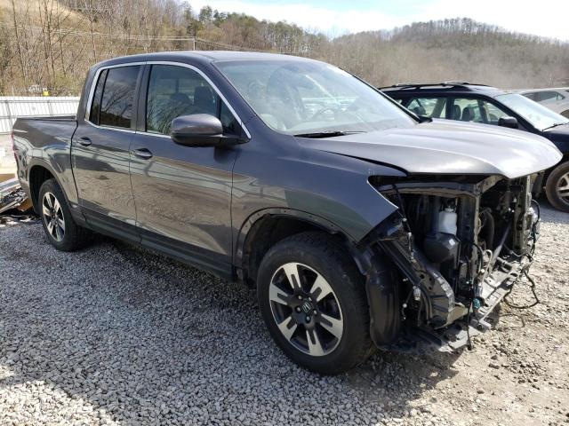 Photo 4 from auction – 2019 HONDA RIDGELINE with VIN 5FPYK3F57KB042081