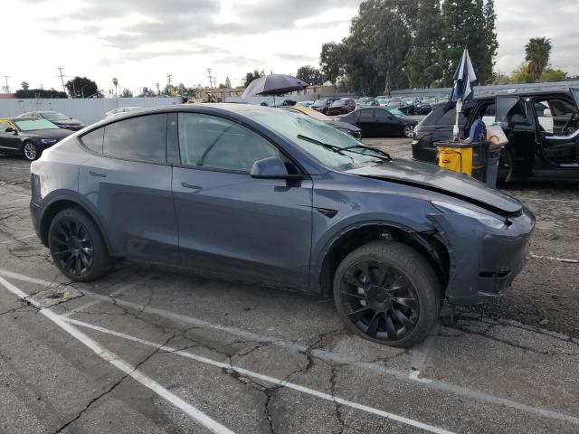 Photo 4 from auction – 2023 TESLA MODEL Y with VIN 7SAYGDEE1PA028363