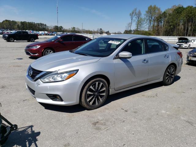 NISSAN ALTIMA 2.5 2018 with VIN 1N4AL3AP2JC128545 - Photo from auction
