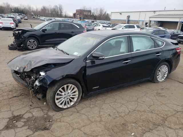 TOYOTA AVALON HYB 2014 with VIN 4T1BD1EB7EU035014 - Photo from auction
