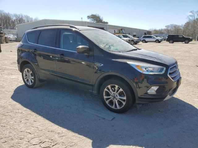 Photo 4 from auction – 2017 FORD ESCAPE SE with VIN 1FMCU9GD5HUB84785