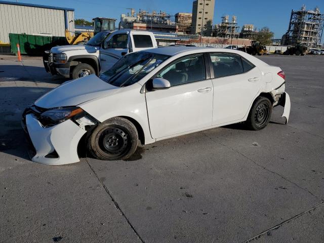 TOYOTA COROLLA L 2017 with VIN 5YFBURHE8HP675193 - Photo from auction