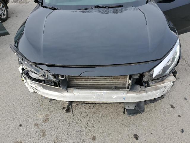 Photo 11 from auction – 2016 HONDA CIVIC LX with VIN 19XFC2F50GE001148