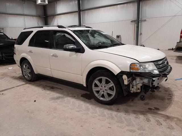 Photo 4 from auction – 2009 FORD TAURUS X L with VIN 1FMDK03W49GA00305