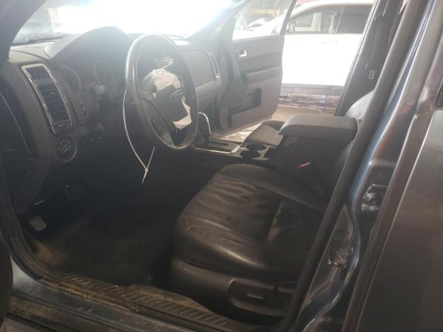 Photo 7 from auction – 2011 FORD ESCAPE LIM with VIN 1FMCU9EG8BKC32117