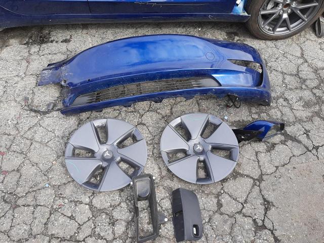 Photo 12 from auction – 2022 TESLA MODEL 3 with VIN 5YJ3E1EA0NF122551