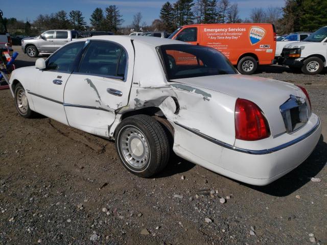 Photo 2 from auction – 2000 LINCOLN TOWN CAR E with VIN 1LNHM81W0YY799246
