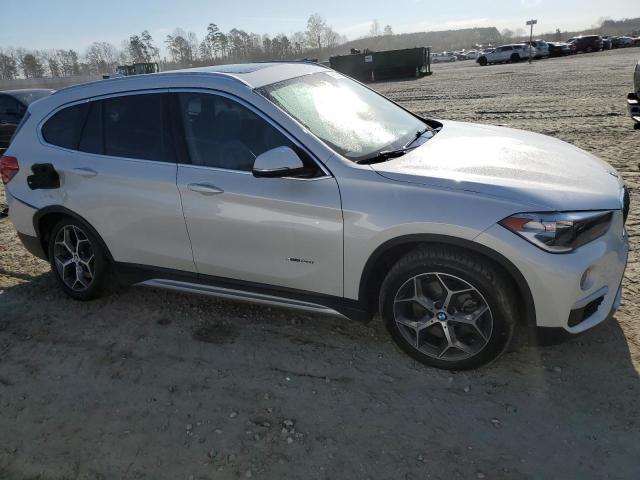 Photo 4 from auction – 2016 BMW X1 XDRIVE2 with VIN WBXHT3C34G5E52425