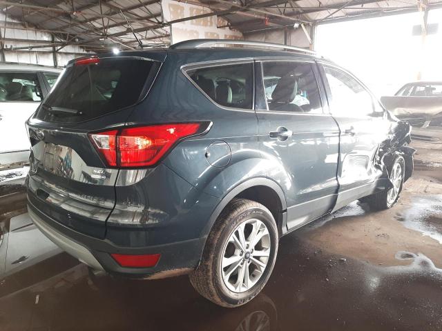 Photo 3 from auction – 2019 FORD ESCAPE SEL with VIN 1FMCU9HD6KUB54703