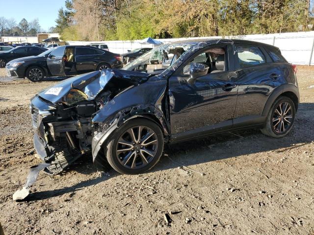 MAZDA CX-3 TOURI 2018 with VIN JM1DKFC76J0300733 - Photo from auction