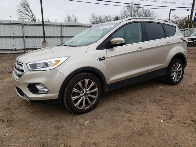 FORD ESCAPE TIT 2018 with VIN 1FMCU0J99JUC85673 - Photo from auction