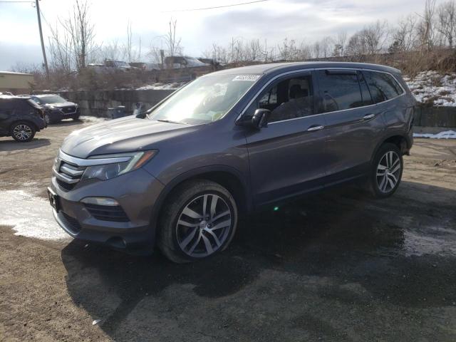 HONDA PILOT TOUR 2016 with VIN 5FNYF6H93GB060342 - Photo from auction