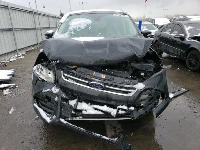 Photo 5 from auction – 2015 FORD ESCAPE TIT with VIN 1FMCU9J98FUC12600