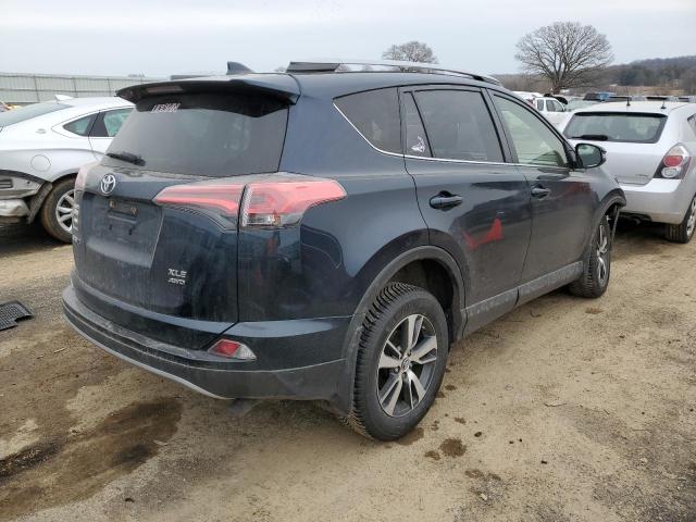 Photo 3 from auction – 2017 TOYOTA RAV4 XLE with VIN JTMRFREV1HJ713820
