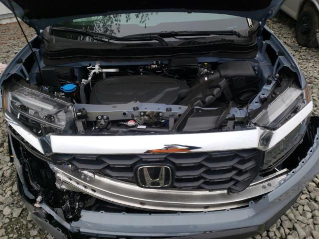 Photo 11 from auction – 2022 HONDA PASSPORT E with VIN 5FNYF8H52NB028195