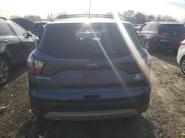 Photo 6 from auction – 2018 FORD ESCAPE SE with VIN 1FMCU9GD1JUB33712