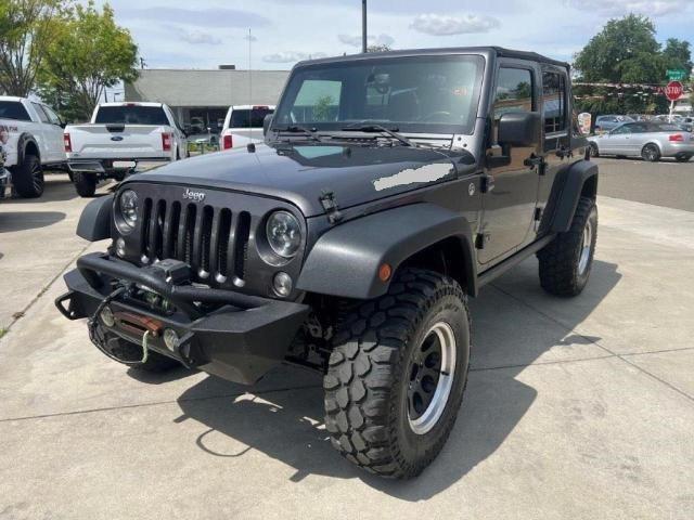 Photo 2 from auction – 2014 JEEP WRANGLER U with VIN 1C4BJWFG0EL233301