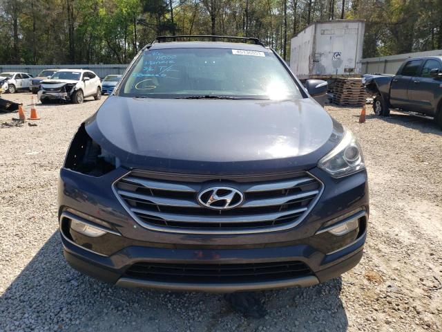 Photo 5 from auction – 2018 HYUNDAI SANTA FE S with VIN 5NMZU3LB4JH079930