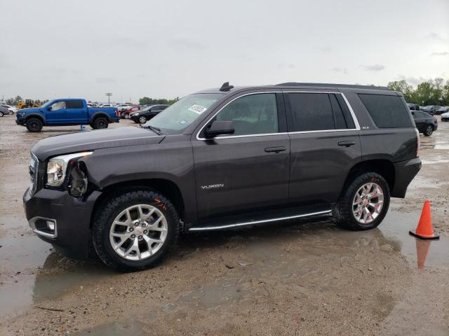 GMC YUKON SLE 2017 with VIN 1GKS1AKC1HR152738 - Photo from auction