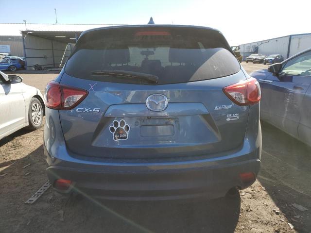 Photo 6 from auction – 2014 MAZDA CX-5 GT with VIN JM3KE2DY1E0403814