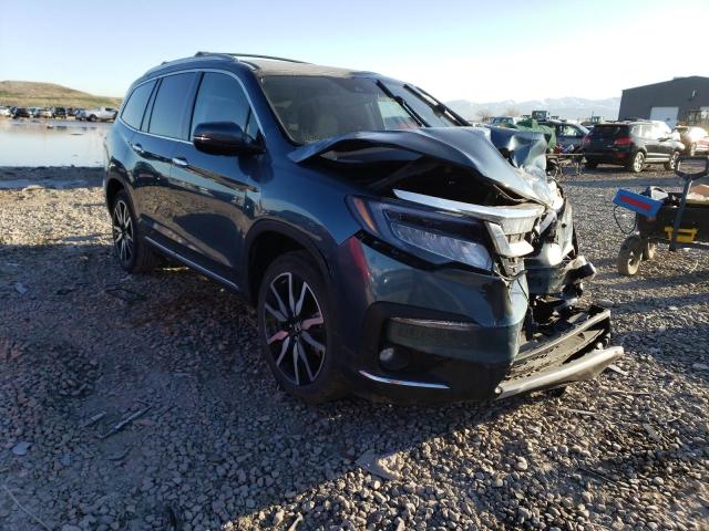 Photo 4 from auction – 2021 HONDA PILOT TOUR with VIN 5FNYF5H66MB031882