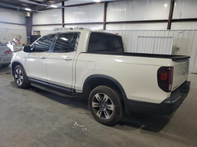 Photo 2 from auction – 2018 HONDA RIDGELINE with VIN 5FPYK3F66JB009385